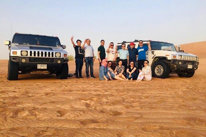 Morning Hummer Desert Safari Dubai: 4-Hour Dune Bashing, Camel Ride & Sandboarding photo 4