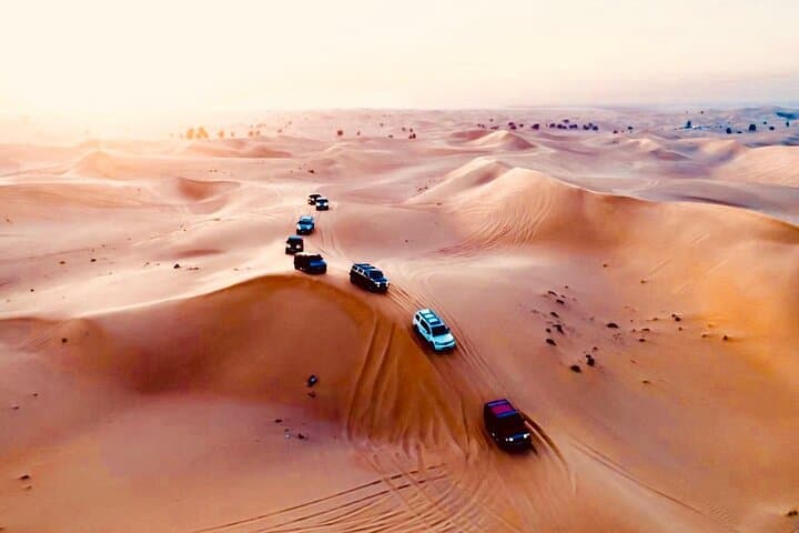 Morning Hummer Desert Safari Dubai: 4-Hour Dune Bashing, Camel Ride & Sandboarding photo 5