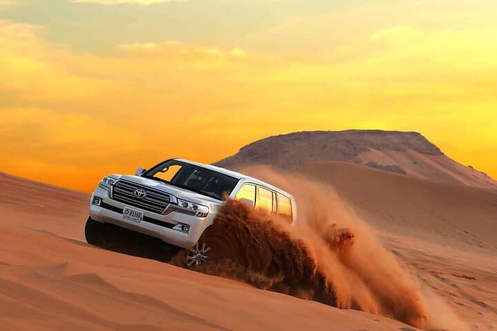 Dubai Evening Desert Safari: Lahbab Dune Bashing, Sunset Camp & BBQ