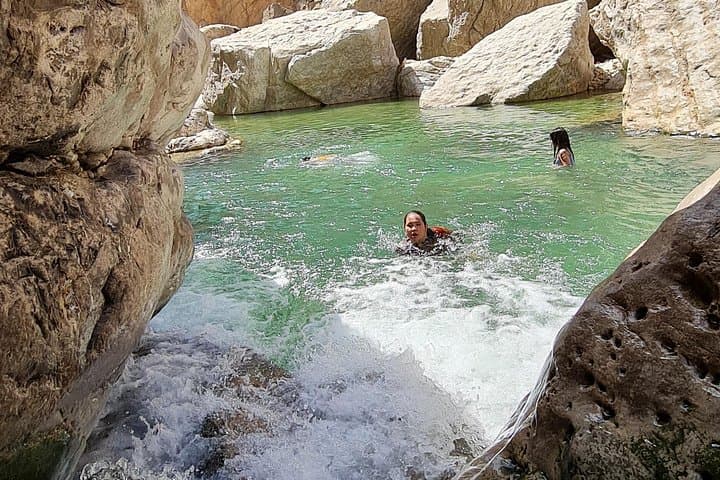 Wahiba Sands and Wadi Hawar Day Trip: Desert Dunes, Blue Pools & Bedouin Encounters photo 3