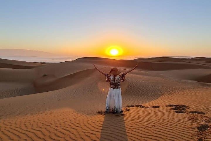 Wahiba Sands and Wadi Hawar Day Trip: Desert Dunes, Blue Pools & Bedouin Encounters photo 1