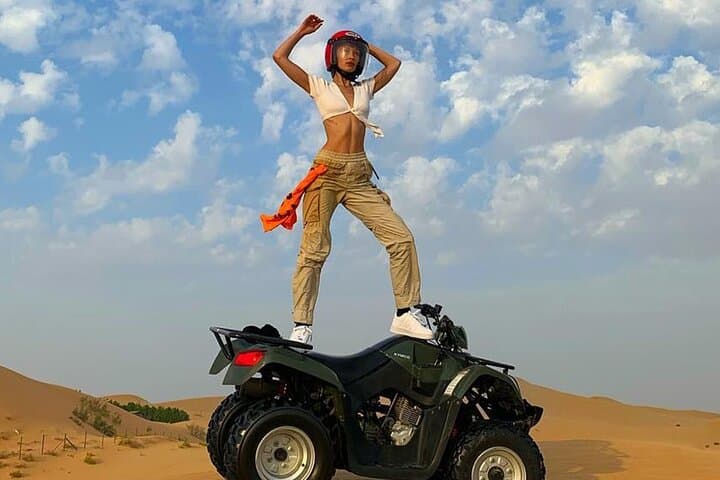 Dubai Evening Desert Safari: Quad Biking, Camel Ride & BBQ Camp Experience photo 2
