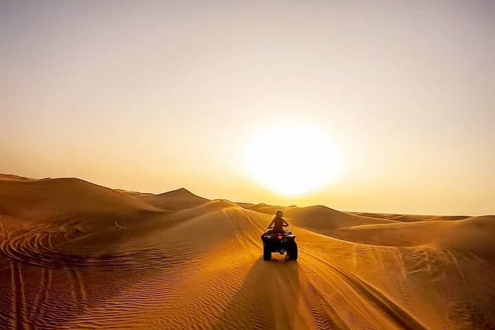 Dubai Evening Desert Safari: Quad Biking, Camel Ride & BBQ Camp Experience photo 4