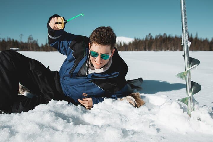 Snowmobiling and Ice-Fishing Lunch in Lapland from Rovaniemi photo 4