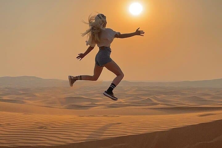 Dubai Red Sand Dune Bashing with BBQ Dinner & Live Desert Shows photo 2