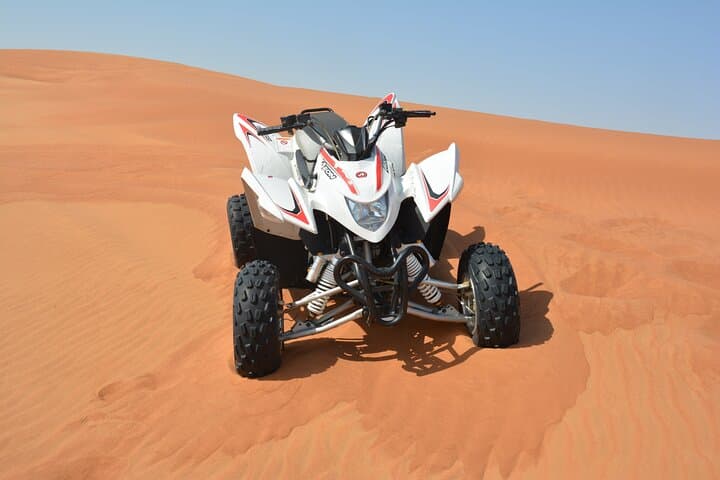 Sunset Quad-Bike Desert Safari with Camel Ride & BBQ Dinner near Dubai photo 3