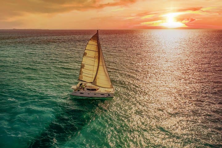 Catamaran to Isla Mujeres — Full-Day Snorkel, Beach Club & Open Bar from Cancún photo 1