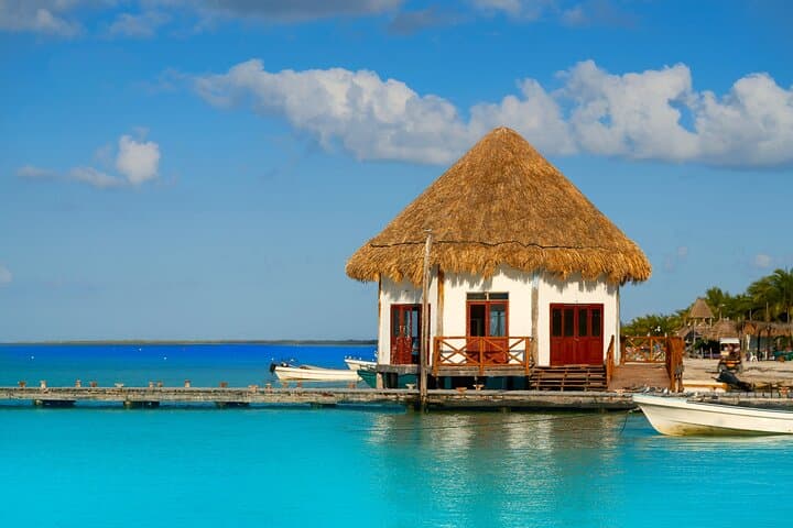 Holbox and Isla de la Pasión Full-Day Tour — Cenote Swim, Punta Mosquito & Lunch