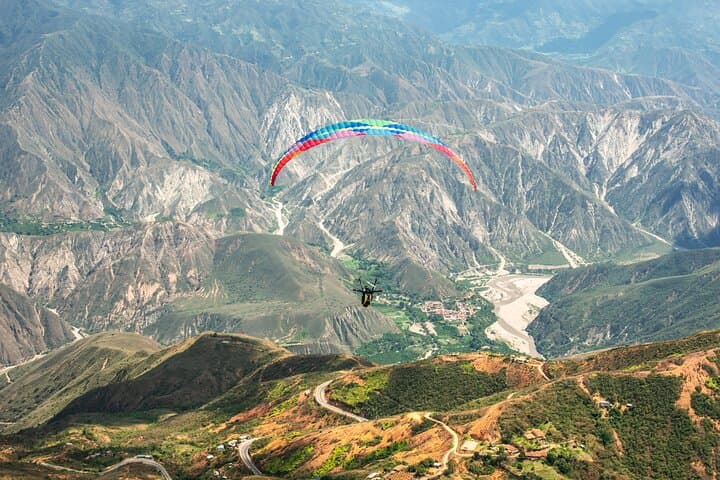 Soar Over Chicamocha Canyon: Tandem Paragliding from 1,550 m