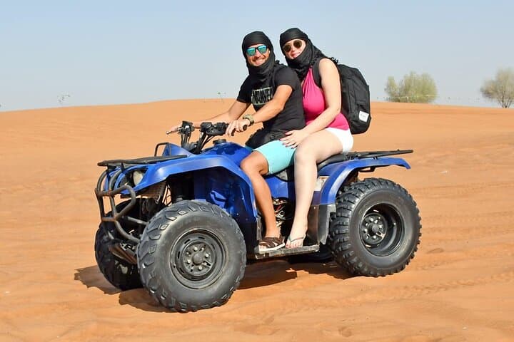 Dubai Red-Dune Desert Safari: Quad Bikes, Camel Rides & Sunset BBQ photo 2