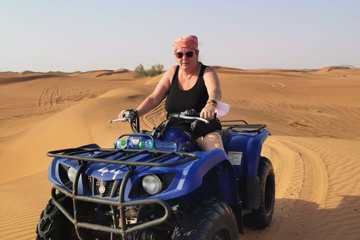 Dubai Red-Dune Desert Safari: Quad Bikes, Camel Rides & Sunset BBQ photo 4