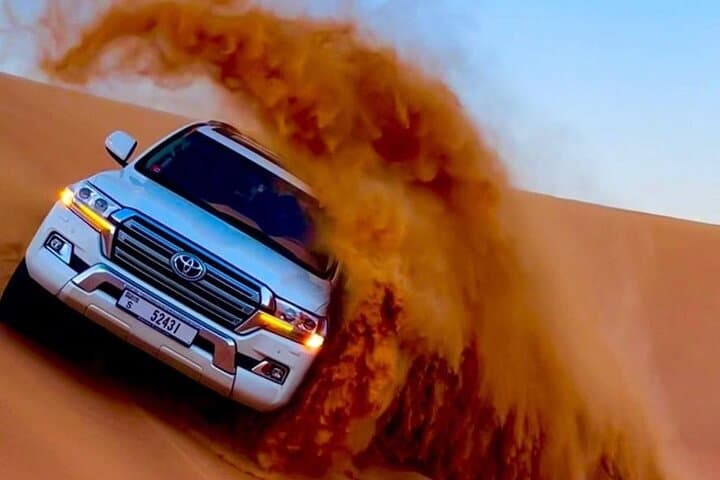 Red Dunes Desert Safari Dubai: Evening Dune Bashing, Camel Ride & BBQ Experience photo 2