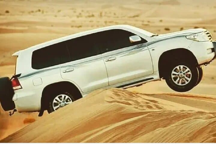 Morning Desert Safari Dubai — Dune Bashing, Sandboarding & Camel Ride in Lahbab photo 4