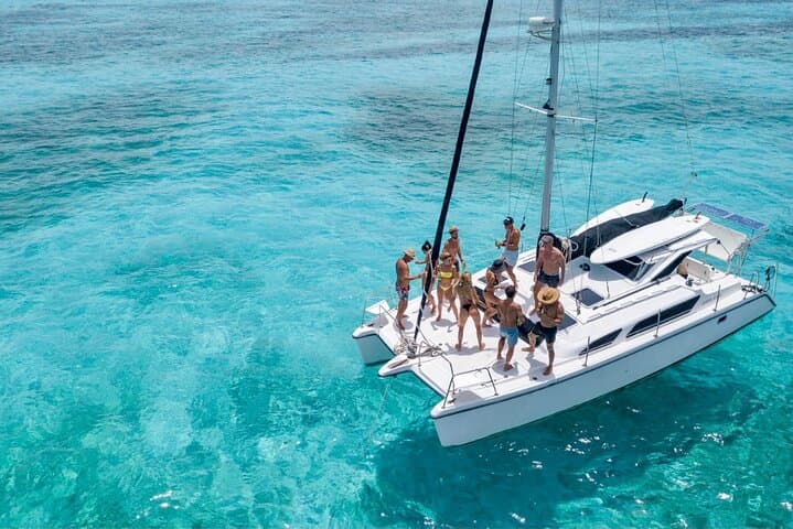 Private Catamaran to Isla Mujeres: Snorkel, Swim and Beach Club Day Trip from Cancun