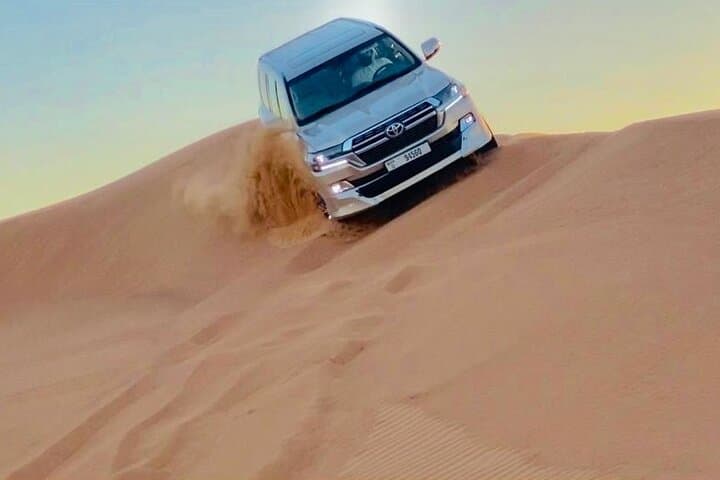 Evening Desert Safari at Lahbab Red Dunes — Dune Bashing, Camel Ride & BBQ photo 2