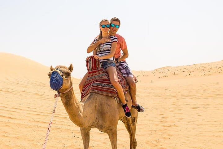 Evening Red Dune Safari in Lahbab: 4x4 Dune Bashing, Camel Rides & BBQ Under the Stars photo 5