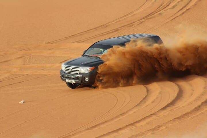 Dubai Desert Safari: Dune Bashing, Camel Rides & Bedouin BBQ