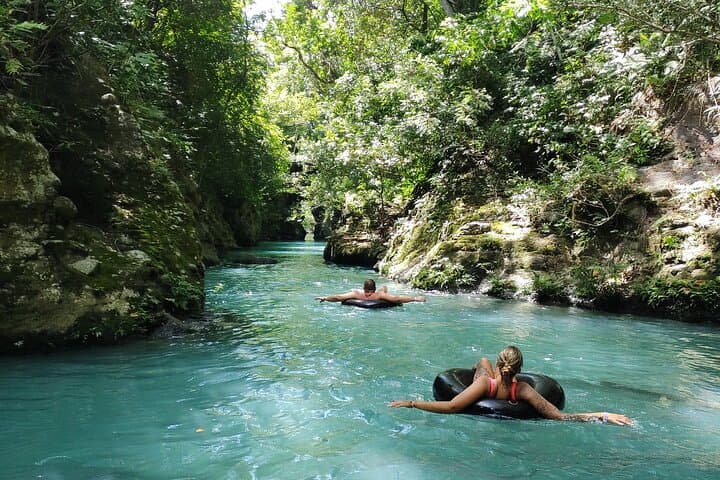 Curubande Waterfalls: Full-Day Blue-River Tubing, Cliff Jumps & Caves photo 1