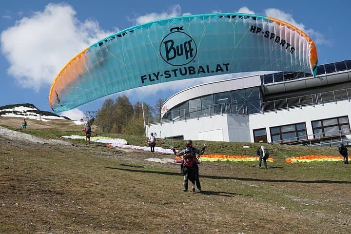 Tandem Paragliding in Fulpmes: Soar Above the Stubai Valley with Certified Pilots photo 2