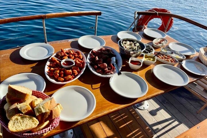 Santorini Caldera Traditional Kaiki Cruise — Swim, Snorkel & Volcano Lunch photo 4