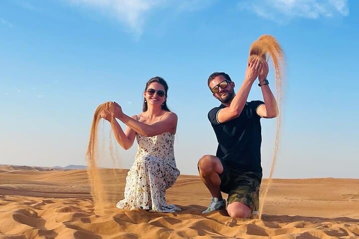 Dubai Evening Desert Safari: Quad Bike ATV, Camel Ride & BBQ Experience photo 6