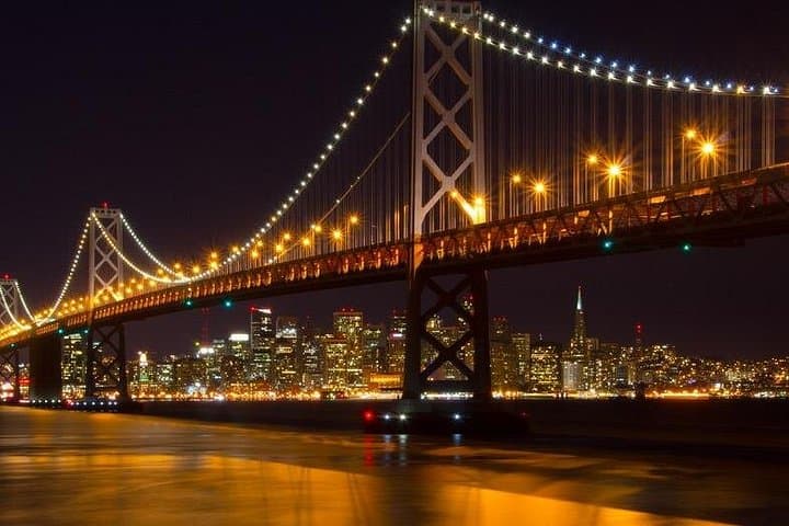 Alcatraz Ferry & Open-Top Bay Bridge Sunset Tour — Audio Tour and Treasure Island Views photo 1