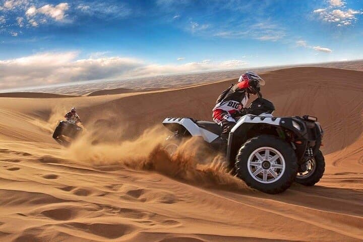 Dubai Red Dunes Morning Quad Bike, Camel Ride & Sandboarding Experience