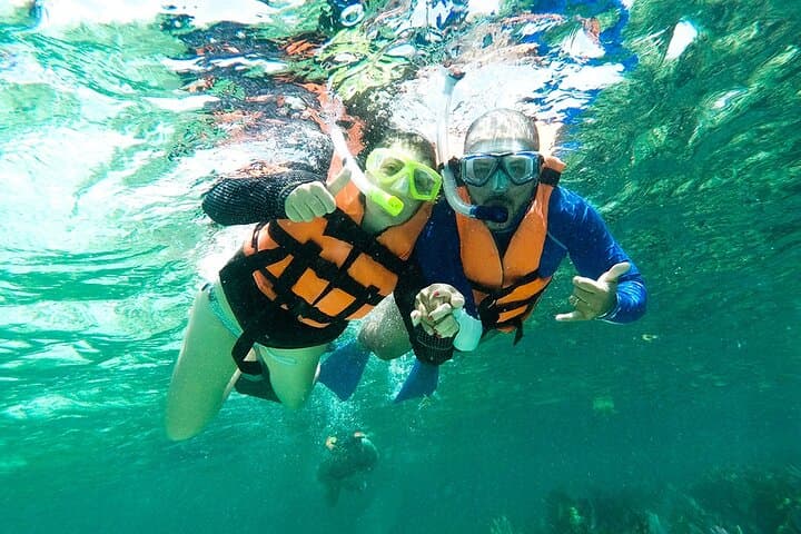 Private Catamaran Party to Isla Mujeres — Snorkel, Beach Club & Open Bar photo 3
