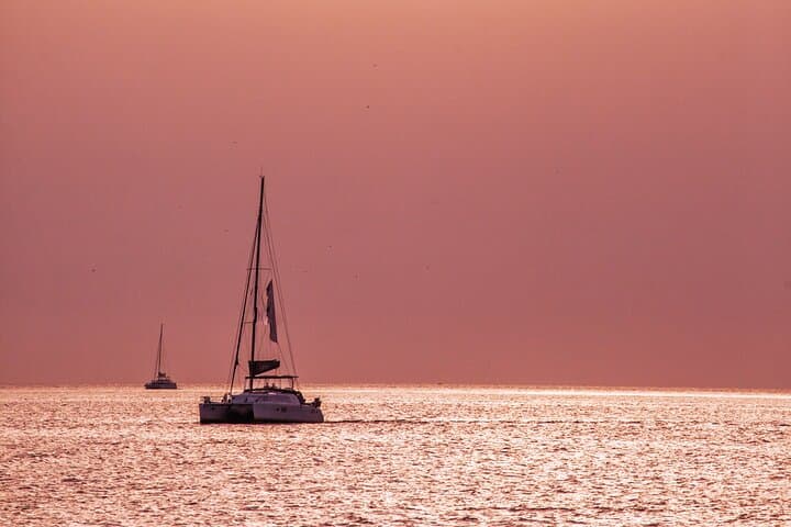 Deluxe Santorini Caldera Sailing: BBQ, Hot Springs & Snorkeling photo 3