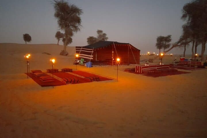 Sunset Falconry & Private Al Lahbab Desert Safari — 4x4 Red Dunes, Camel Ride & BBQ