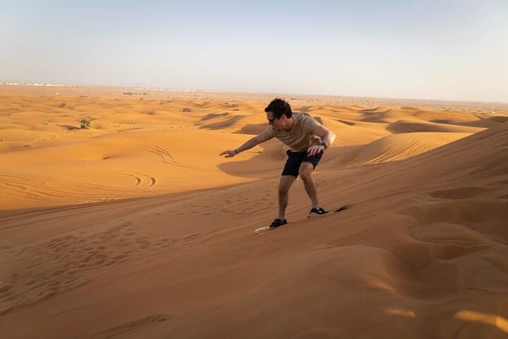 Dubai Red Dunes Self-Drive Quadbike with Camel and Falcon Experience photo 4