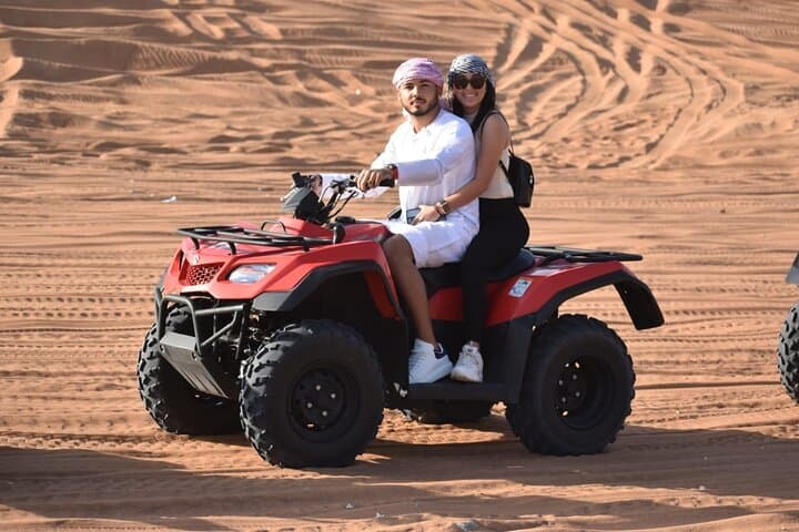Dubai Evening Desert Safari: Quad Bike ATV, Camel Ride & BBQ Experience