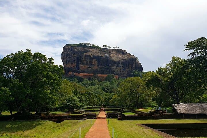 Kandy to Sigiriya: Private Day Trip with Village Tour & Dambulla Cave Temple photo 4
