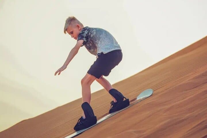 Dubai Desert Quad Bike Safari: Sandboarding, Camel Ride & BBQ Evening photo 4