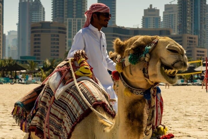 Dubai Desert Quad Bike Safari: Sandboarding, Camel Ride & BBQ Evening photo 6