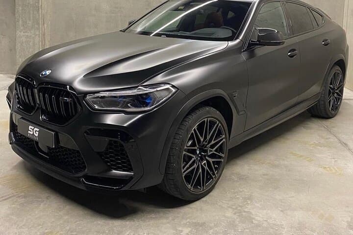 BMW X6 Luxury Transfer San Juan — Private Chauffeur with Champagne photo 2