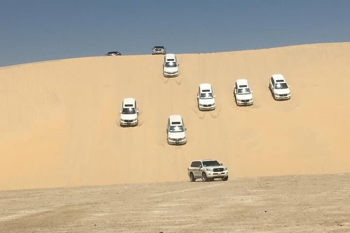 Half-Day Desert Safari & Inland Sea from Doha — Dune Bashing, Sandboarding & Camel Ride photo 2