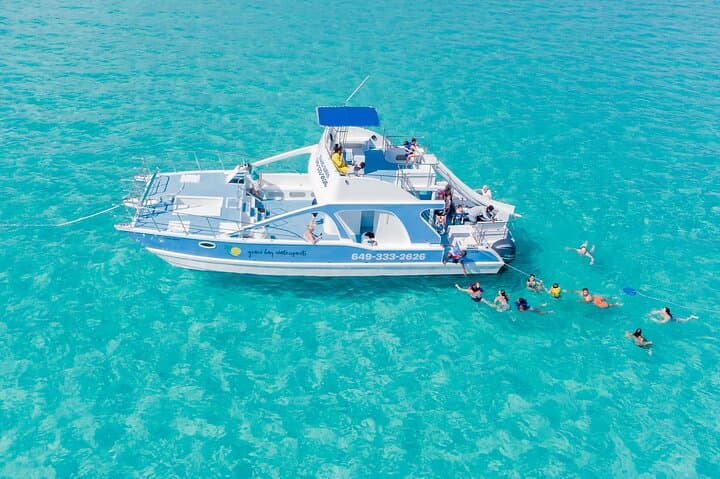 Private Catamaran Tour from Providenciales: Half Moon Bay & Little Water Cay photo 1
