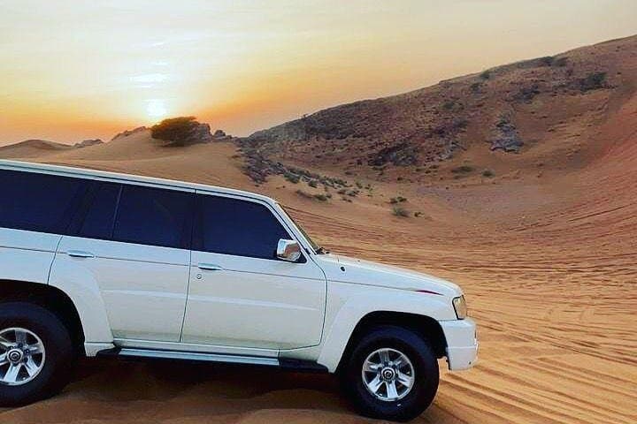 Red Dunes Desert Safari from Dubai: Sunset Rides, Sandboarding & BBQ Camp photo 4