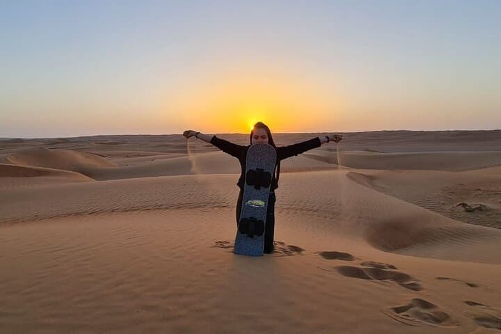 Muscat Full-Day Private Desert Adventure: Quad Biking, Camel Ride & Sandboarding