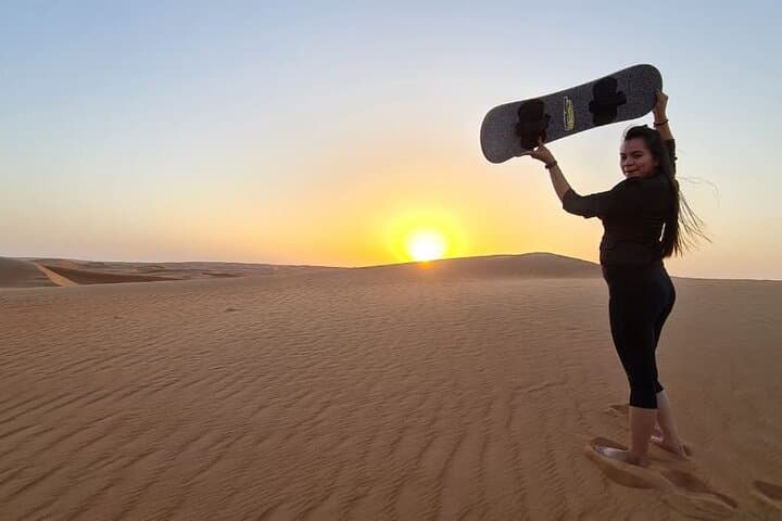 Muscat Full-Day Private Desert Adventure: Quad Biking, Camel Ride & Sandboarding photo 2