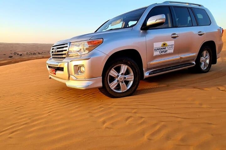 Muscat Full-Day Private Desert Adventure: Quad Biking, Camel Ride & Sandboarding photo 6