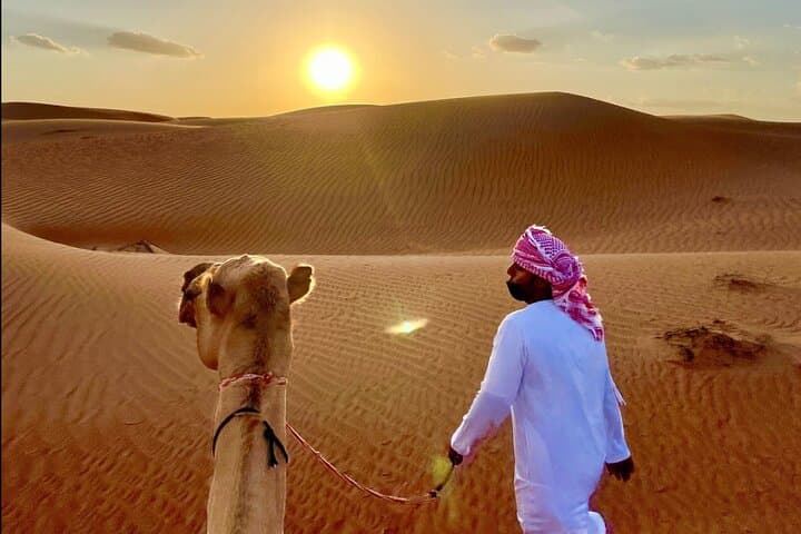 Muscat Full-Day Private Desert Adventure: Quad Biking, Camel Ride & Sandboarding photo 4