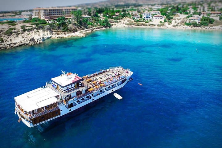 Full-Day Wave Dancer Sunshine Cruise from Paphos: Akamas, Sea Caves & Coral Bay photo 1