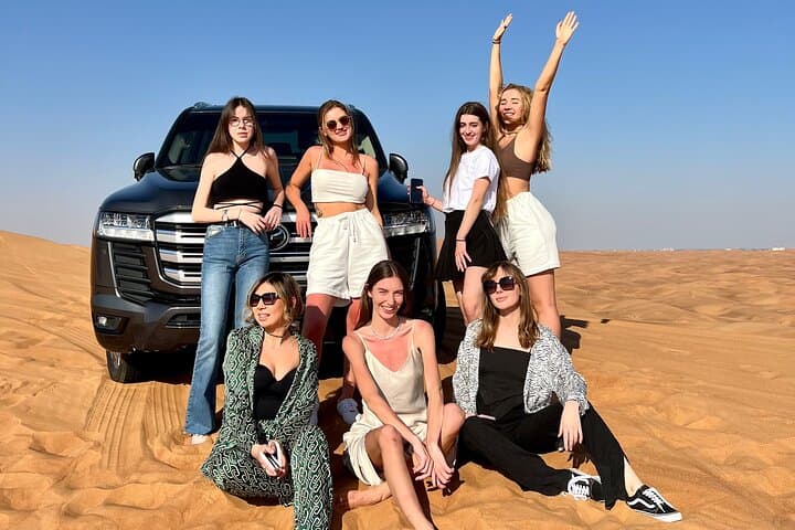 Dubai Desert Safari with BBQ & Sandboarding: Dune Bash, Camel Ride, Night Camp photo 6