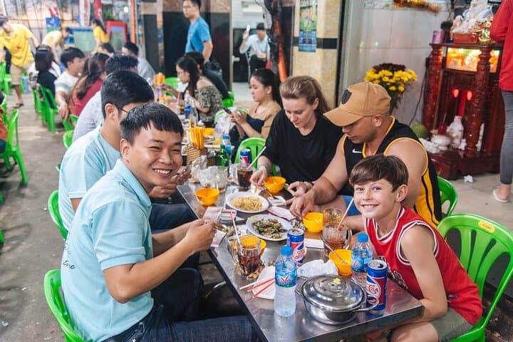 Saigon Scooter Street Food Tour: Unseen Districts & Night Eats photo 2