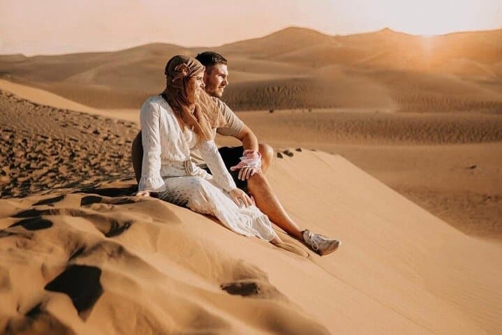 Evening Red Dunes Desert Safari: Dune Bashing, Camel Ride & BBQ in Dubai