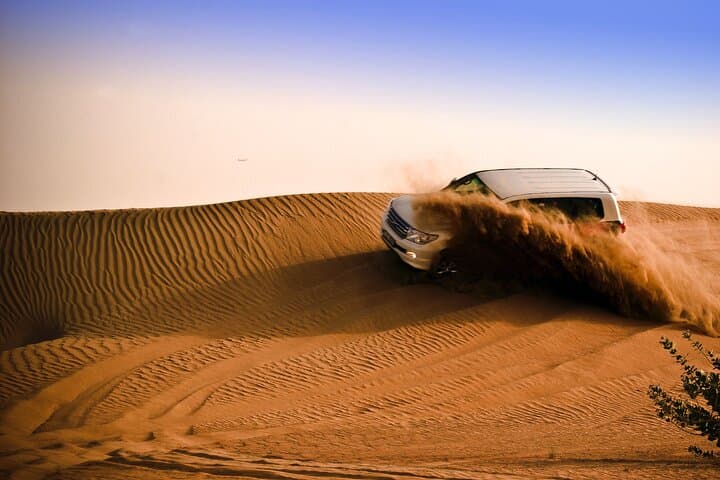 Evening Dubai Desert Safari: Dune Bashing, Sandboarding & BBQ Under the Sunset photo 3