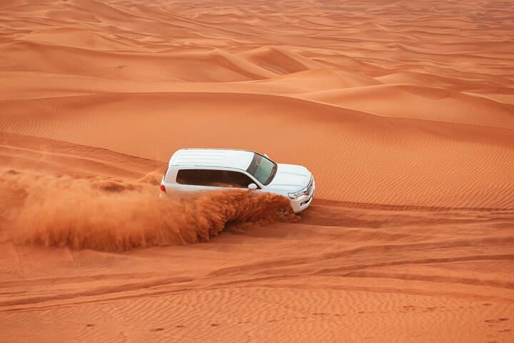 Evening Dubai Desert Safari: Dune Bashing, Sandboarding & BBQ Under the Sunset photo 2