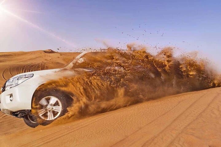 Evening Dubai Desert Safari: Dune Bashing, Sandboarding & BBQ Under the Sunset photo 4